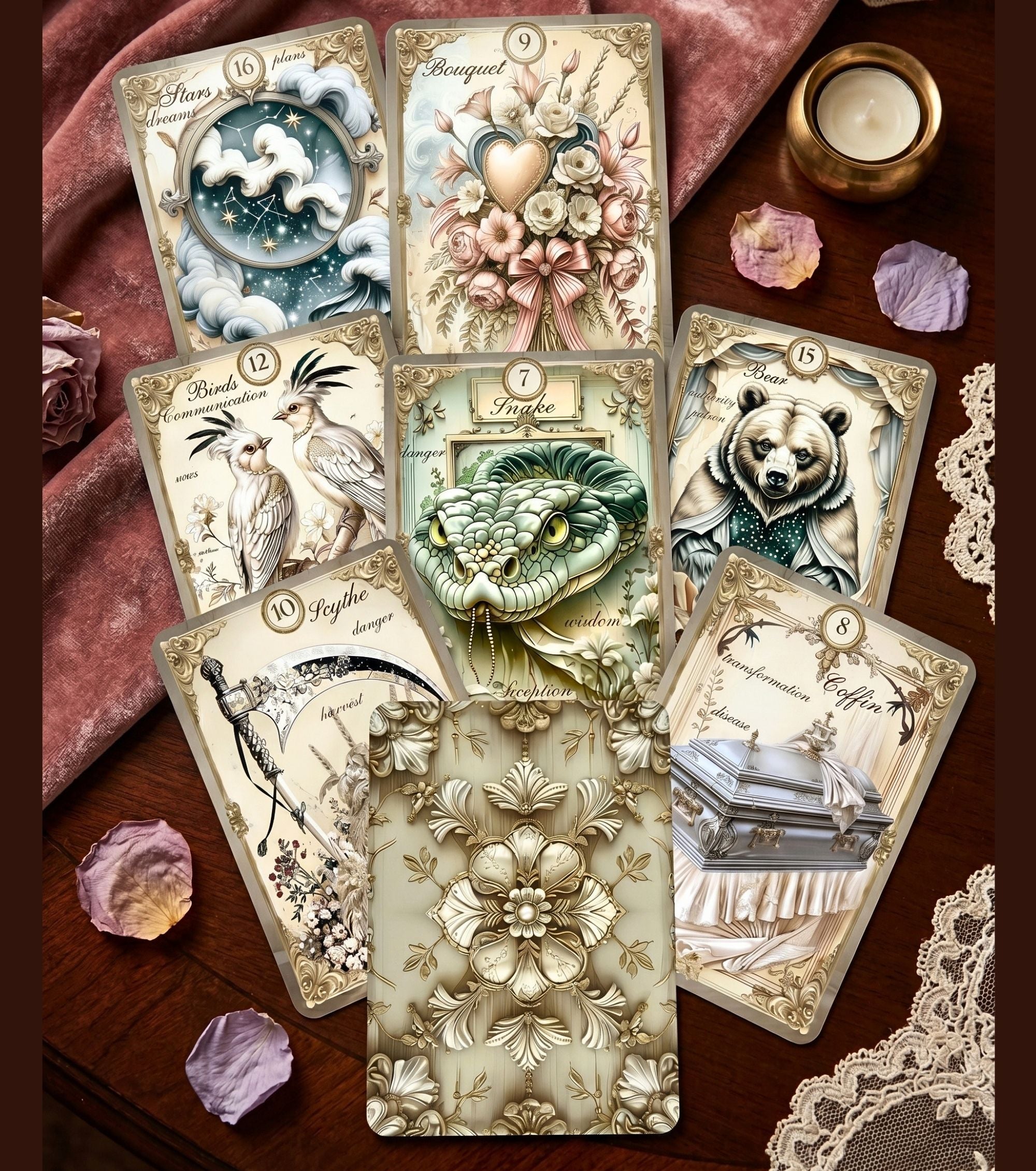 Gilded Dreams Lenormand cards spread on rose velvet with lace — handmade vintage oracle showing Snake, Bear, Bouquet and Coffin cards with ivory floral card back, MardocCraft