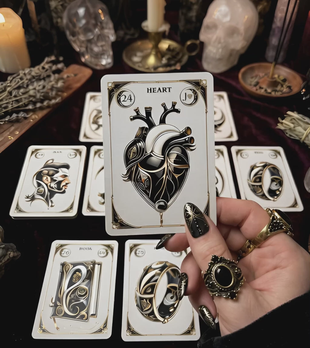Heart card from Mystic Gold Noir Lenormand — gothic oracle deck in hand, black gold divination