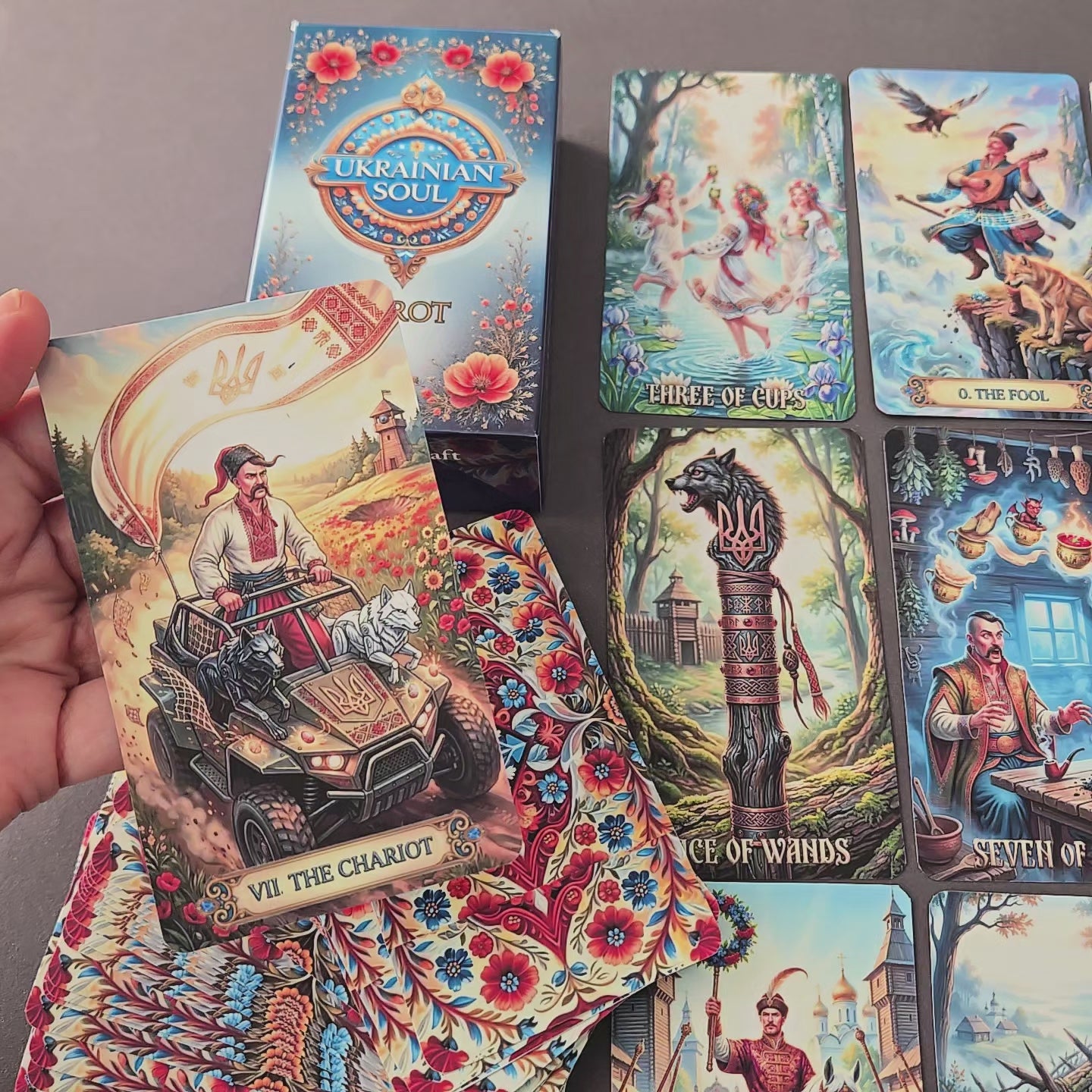 Ukrainian Soul Tarot cards showcase — Slavic folk art illustrations including The Chariot, Three of Cups, The Fool — handmade deck MardocCraft